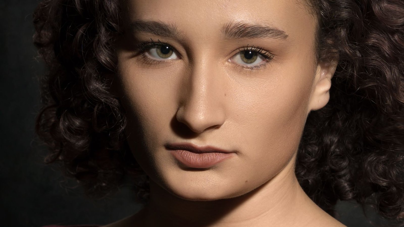 Real photo: portrait headshot, illustrating this section