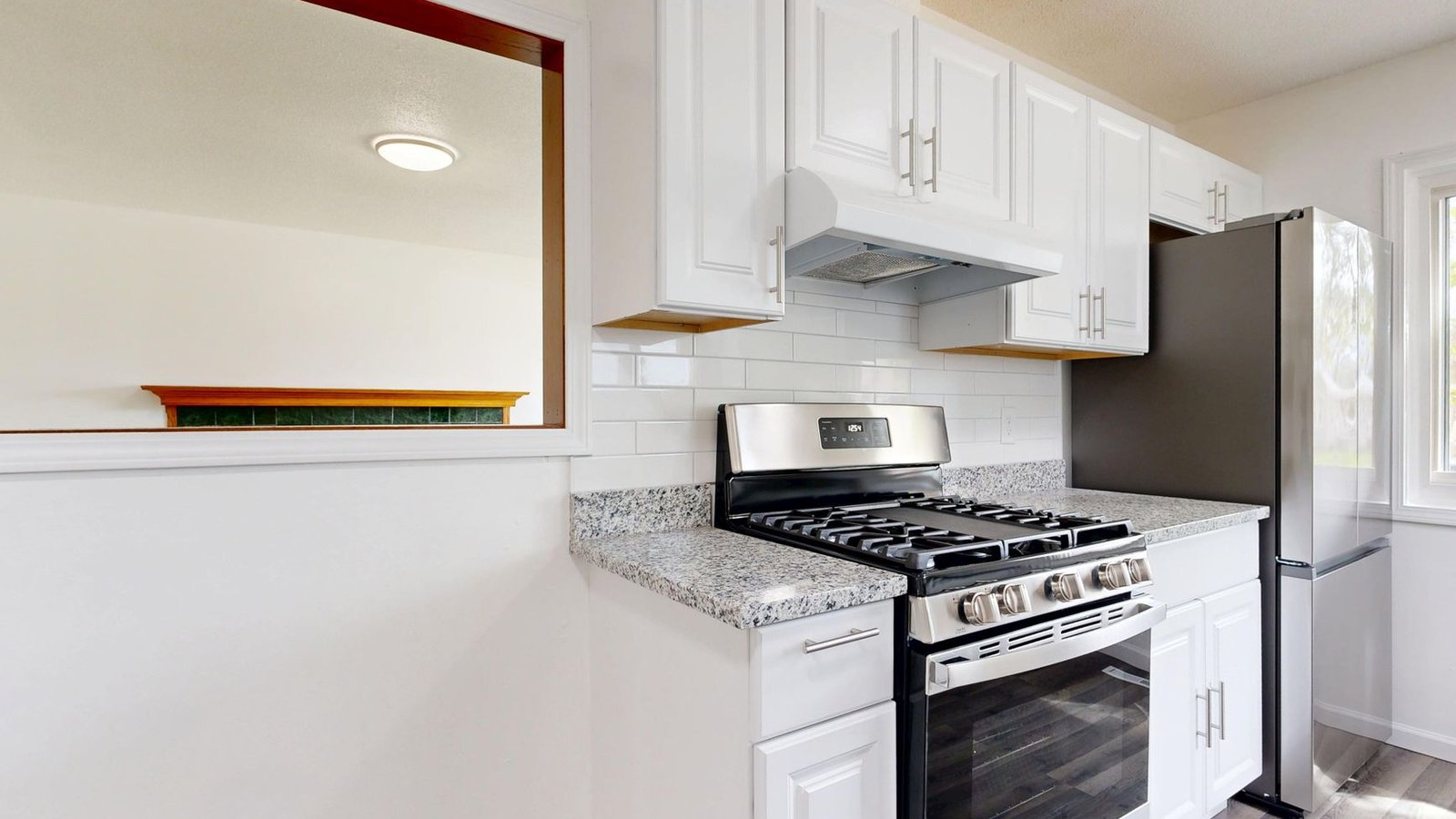Bright renovated kitchen interior photographed for a home renovation before and after comparison